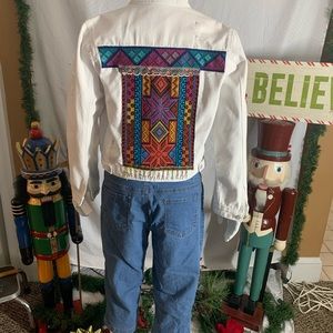 SOHO distressed white jacket with embroidery bought in Cancun size 3 which is ML